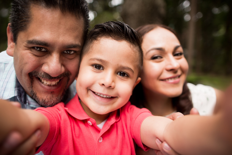 family-smiling-with-child